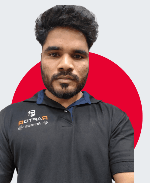 Experienced male yoga coach guiding Vinyasa session at FitMechanism studio in Hyderabad