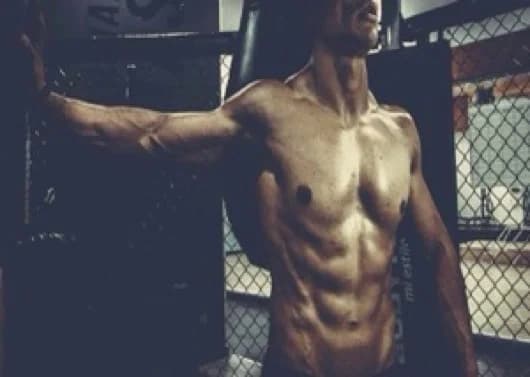 Yoga instructor maintaining hygiene protocols before client session in Madhapur