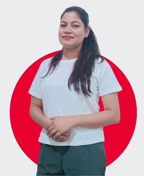 Female yoga instructor supporting student with calm breathing posture during wellness session